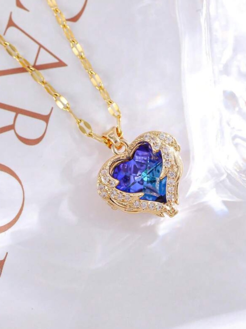 Gold Heart Pendant Necklace with Blue Crystal